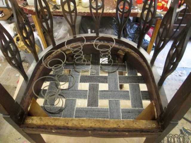 Springs and webbing exposed during re-springing